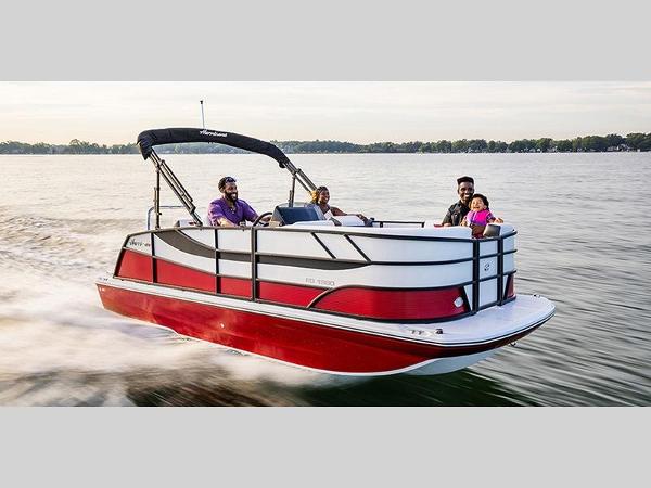 Slide: The Image of 2023 Hurricane FD 198 boat cruising on a lake with passengers. - 1