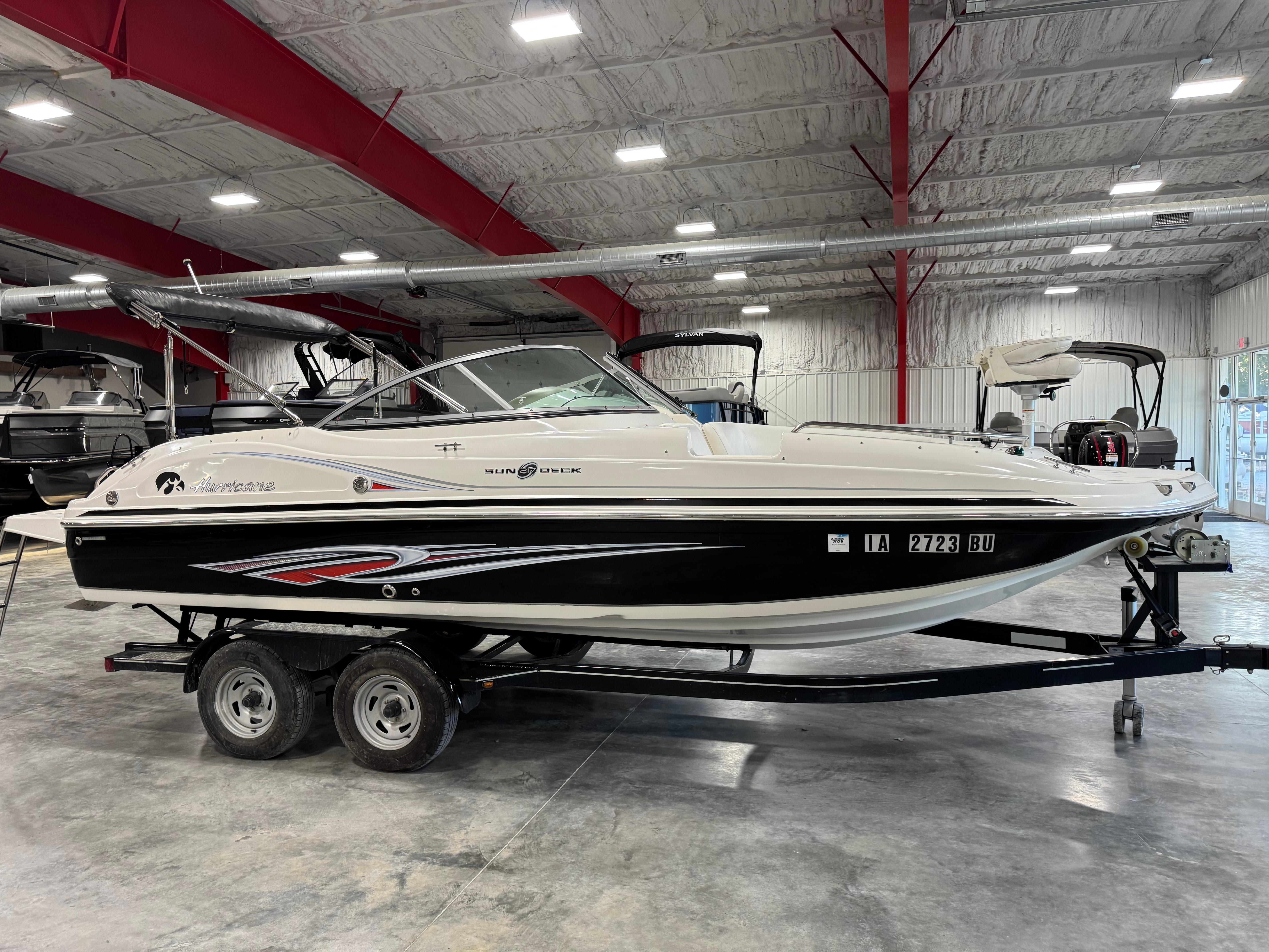 Slide: The Image of 2011 Hurricane SD217 boat on trailer in indoor showroom. - 4