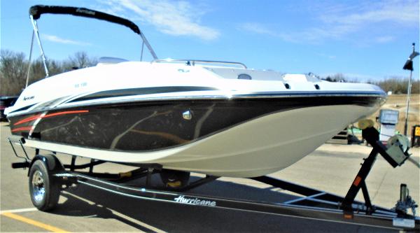Slide: The Image of 2019 Hurricane SS188 boat on trailer, sleek design, parked outdoors. - 3