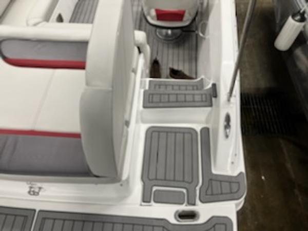 Slide: The Image of 2023 Hurricane SS188 boat interior with gray and red seating and non-slip flooring. - 11