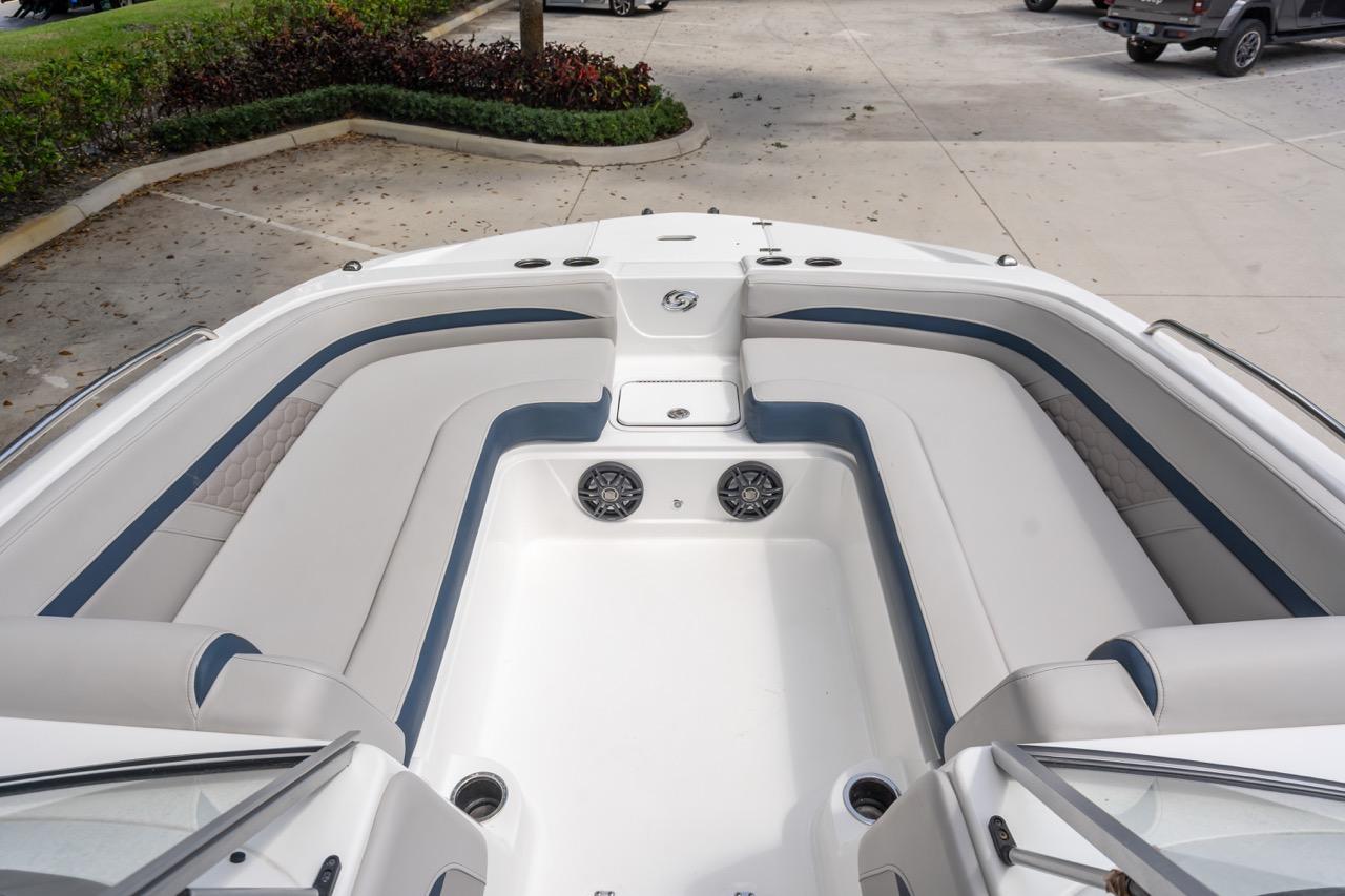 Slide: The Image of 2025 Hurricane SunDeck 217 OB boat interior with spacious seating and modern design. - 13