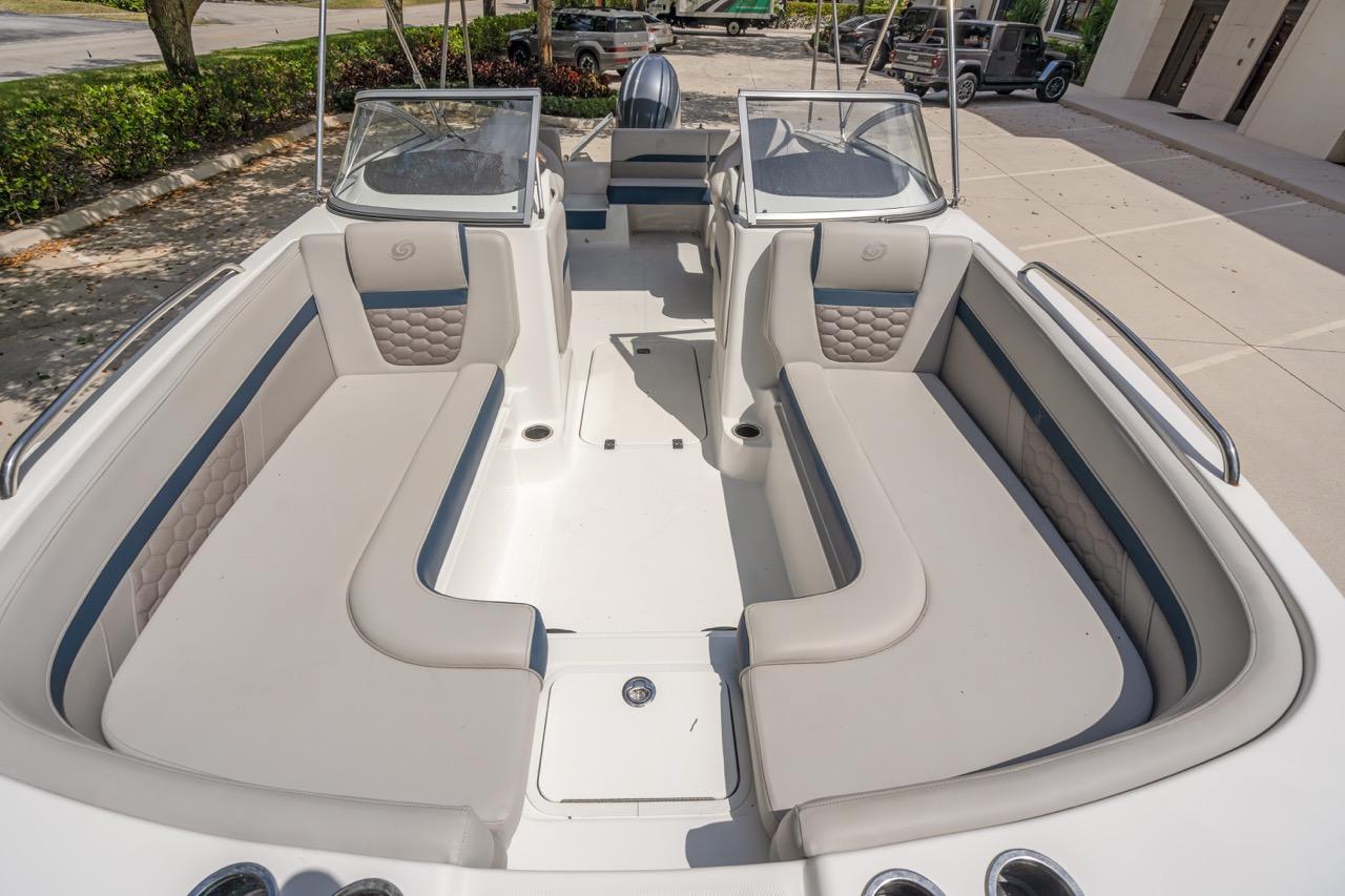 Slide: The Image of 2025 Hurricane SunDeck 217 OB boat interior with spacious seating and modern design. - 7