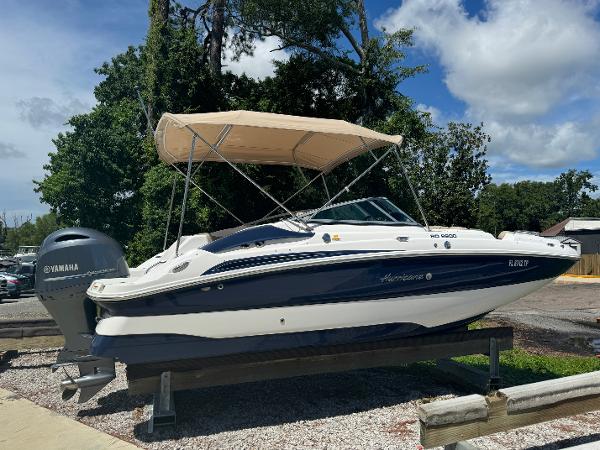 Slide: The Image of 2023 Hurricane SunDeck 2200 DC OB boat with Yamaha outboard motor. - 10