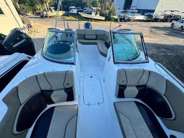 Slide: The Image of 2023 Hurricane SunDeck 2200 DC OB boat interior with spacious seating and open deck. - 12