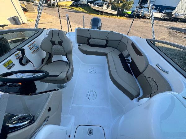 Slide: The Image of 2023 Hurricane SunDeck 2200 DC OB boat interior with spacious seating and modern design. - 15