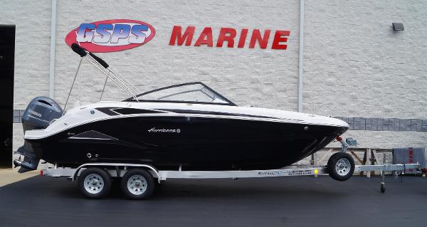 Slide: The Image of 2023 Hurricane SunDeck 235 OB boat on trailer at GSPS Marine dealership. - 1