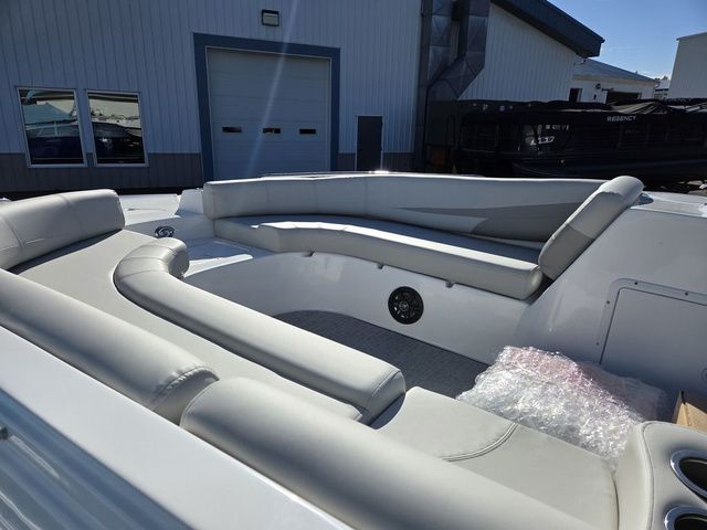 Slide: The Image of 2026 Hurricane SunDeck Sport 201 IO boat interior with spacious seating and modern design. - 7