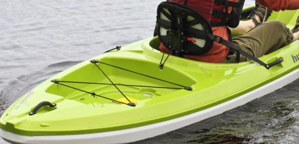Slide: The Image of 2023 Hurricane Kayaks Skimmer 116 in bright green on water. - 4