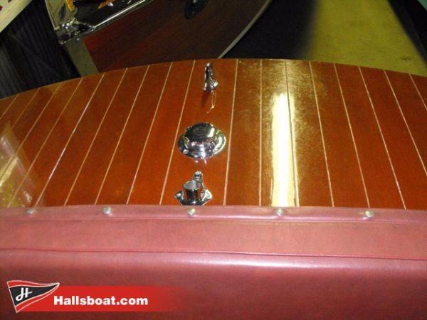 Slide: The Image of 1950 Hutchinson Utility boat with polished wooden deck and chrome fittings. - 8
