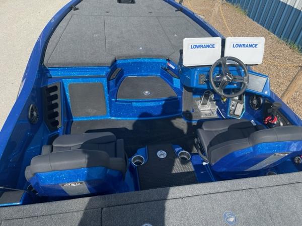 Slide: The Image of 2024 iKon LX21 boat interior with dual Lowrance screens and blue accents. - 4