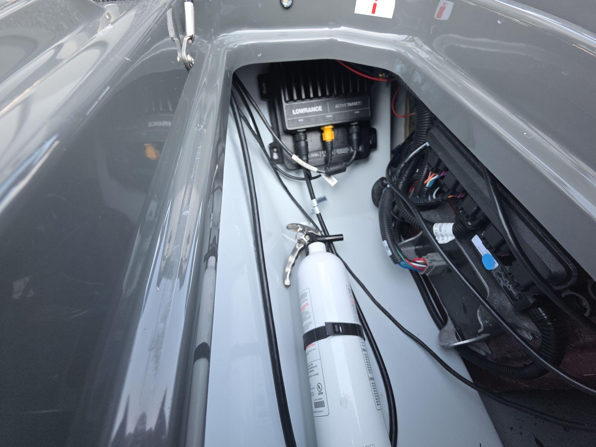 Slide: The Image of Interior view of iKon LX21 2025 boat showing equipment and wiring. - 11
