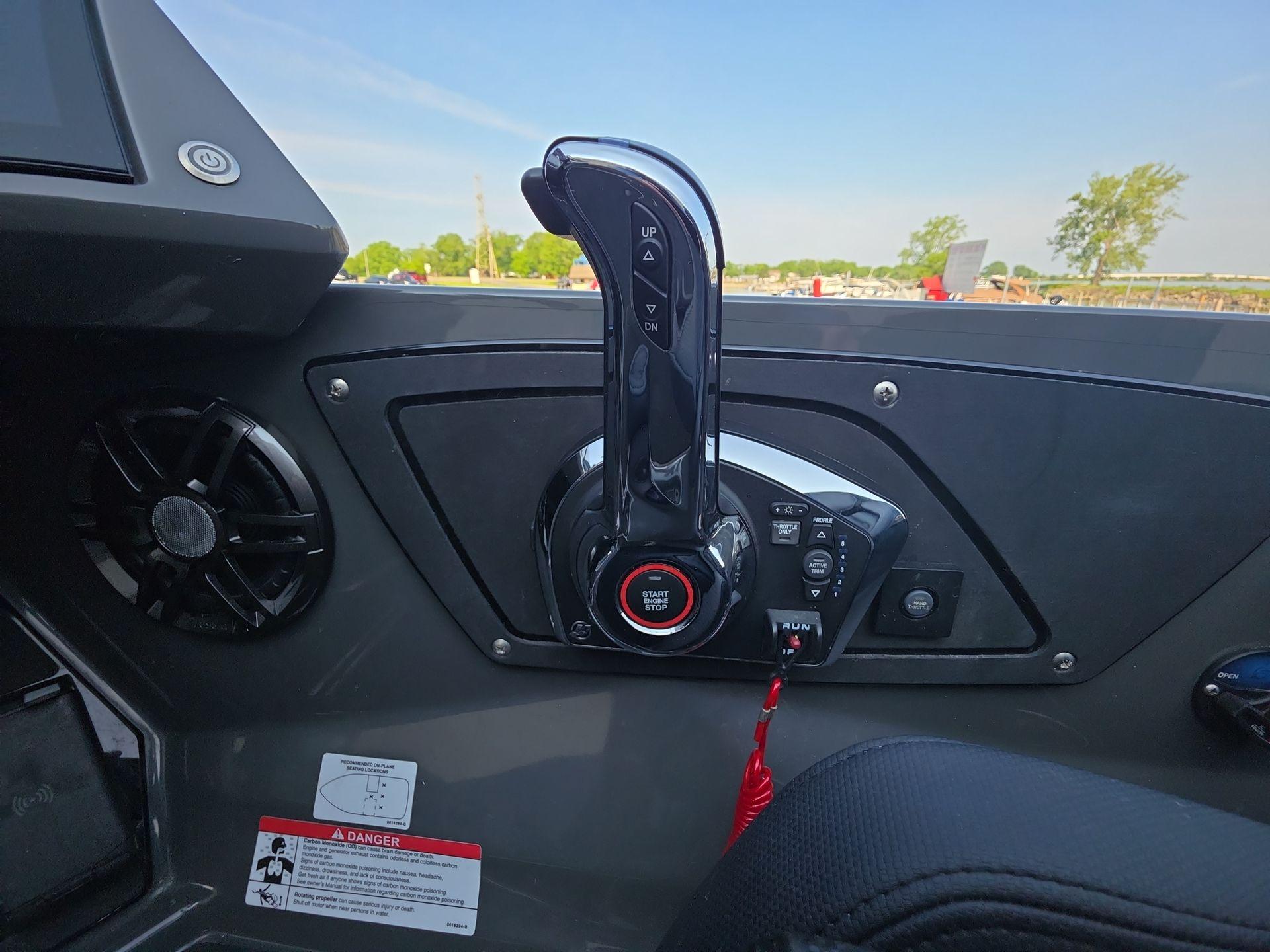 Slide: The Image of Control panel of iKon LX21 boat, featuring start/stop button and throttle lever, 2025 model. - 15