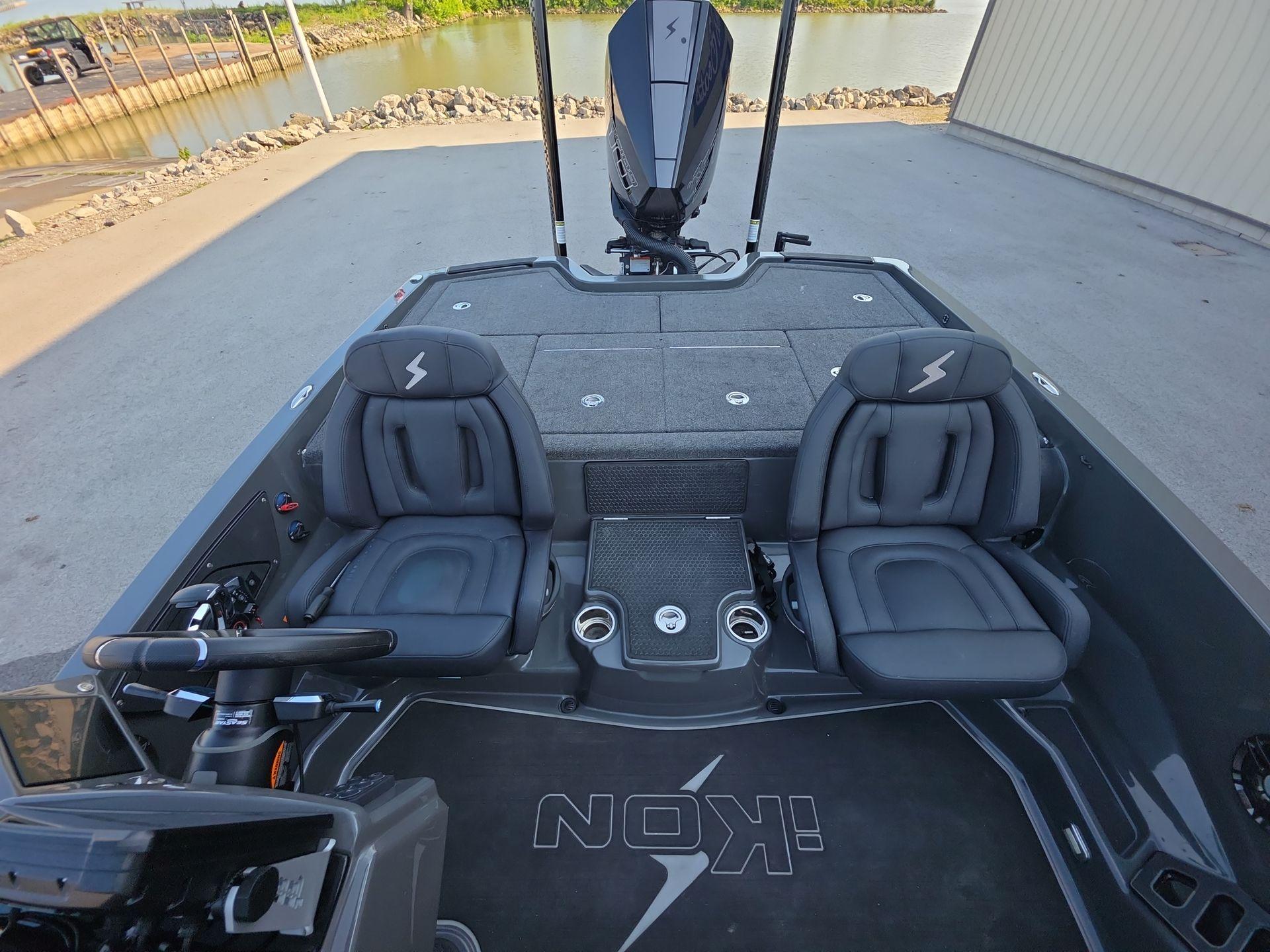 Slide: The Image of 2025 iKon LX21 boat interior with dual seats and modern dashboard. - 17