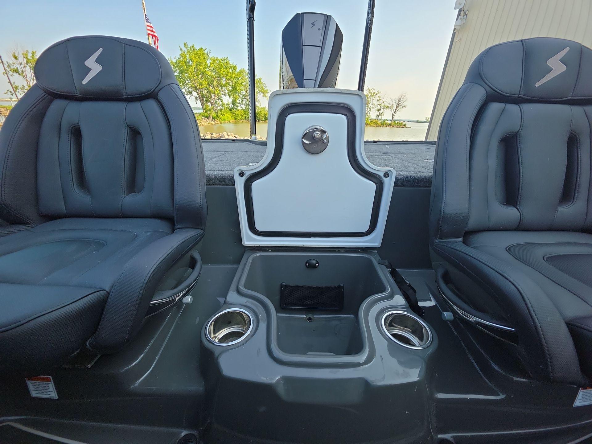Slide: The Image of Interior of 2025 iKon LX21 boat with two seats and storage compartment. - 22