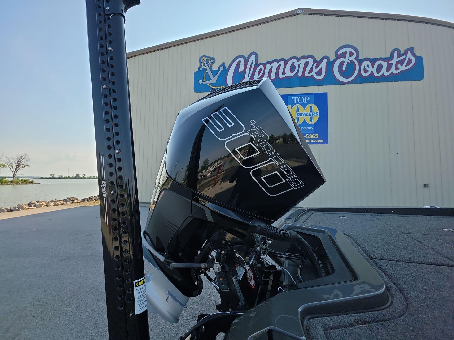Slide: The Image of iKon LX21 boat engine at Clemons Boats dealership, 2025 model. - 4