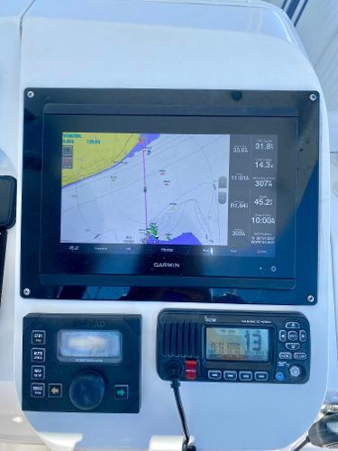 Slide: The Image of Garmin navigation system on a 2002 Intrepid 348 Walkaround boat. - 1