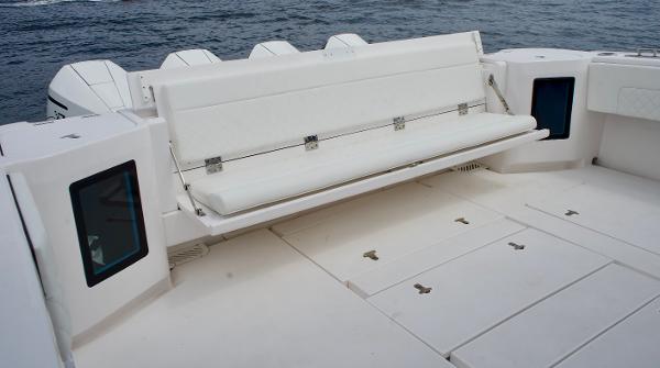 Slide: The Image of 2023 Intrepid 475 Panacea boat with fold-down seating and spacious deck. - 15