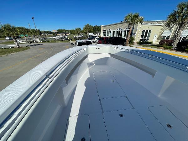 Slide: The Image of 2024 Invincible 33 Open Fisherman boat, spacious deck view. - 25