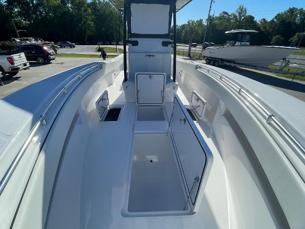 Slide: The Image of 2024 Invincible 33 Open Fisherman boat interior with storage compartments. - 26