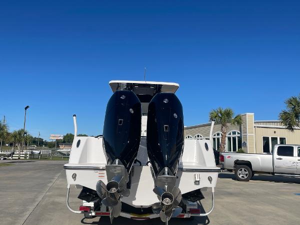 Slide: The Image of 2024 Invincible 33 Open Fisherman boat with dual outboard engines. - 3