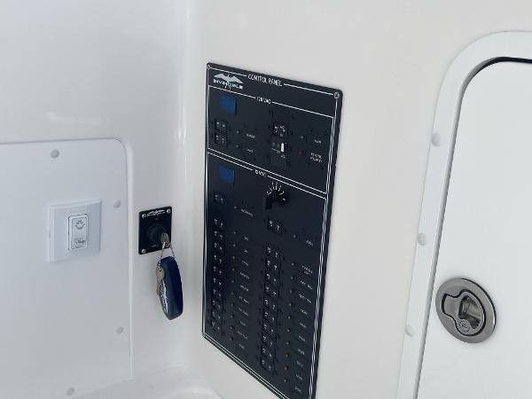 Slide: The Image of Control panel of a 2024 Invincible 33 Open Fisherman boat. - 34
