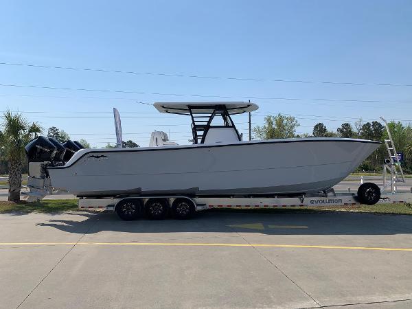 Slide: The Image of 2024 Invincible 35 Catamaran on a trailer, side view. - 0