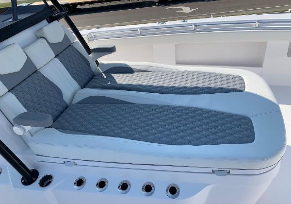Slide: The Image of 2024 Invincible 35 Catamaran with luxurious dual lounge seating. - 21