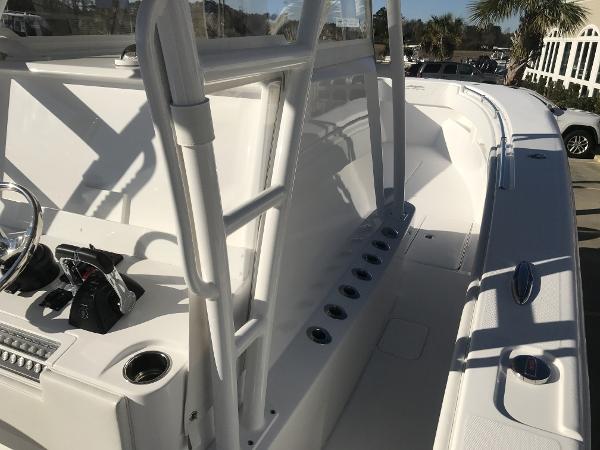 Slide: The Image of 2024 Invincible 36 boat deck with rod holders and control panel. - 7