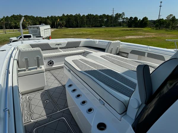 Slide: The Image of 2024 Invincible 40 Catamaran interior with spacious seating and modern design. - 12