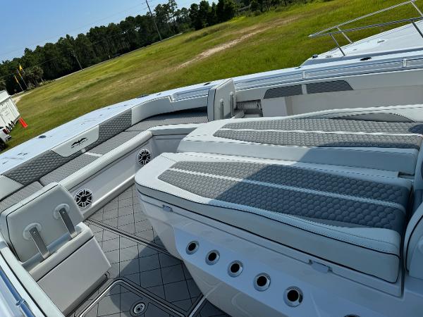 Slide: The Image of 2024 Invincible 40 Catamaran interior with luxurious seating and modern design. - 13