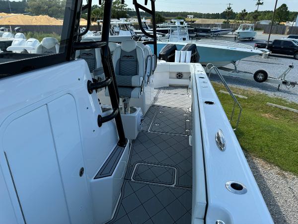 Slide: The Image of 2024 Invincible 40 Catamaran interior with sleek seating and modern design. - 14