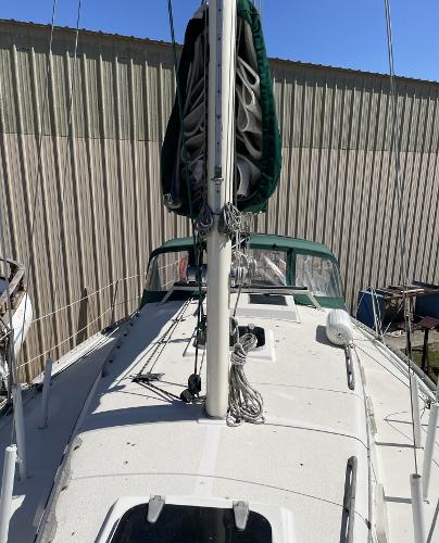 Slide: The Image of 1983 Irwin Citation 34 sailboat deck view with mast and rigging. - 5