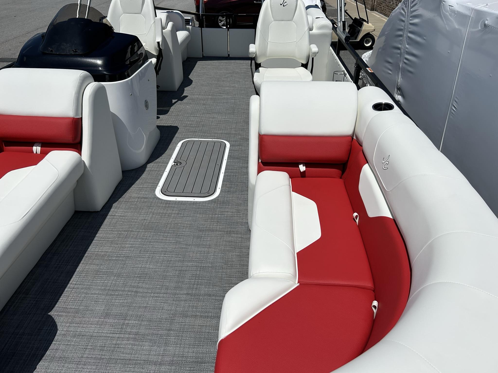 Slide: The Image of 2024 JC 247 TT boat interior with red and white seating, Suzuki 250HP engine. - 12