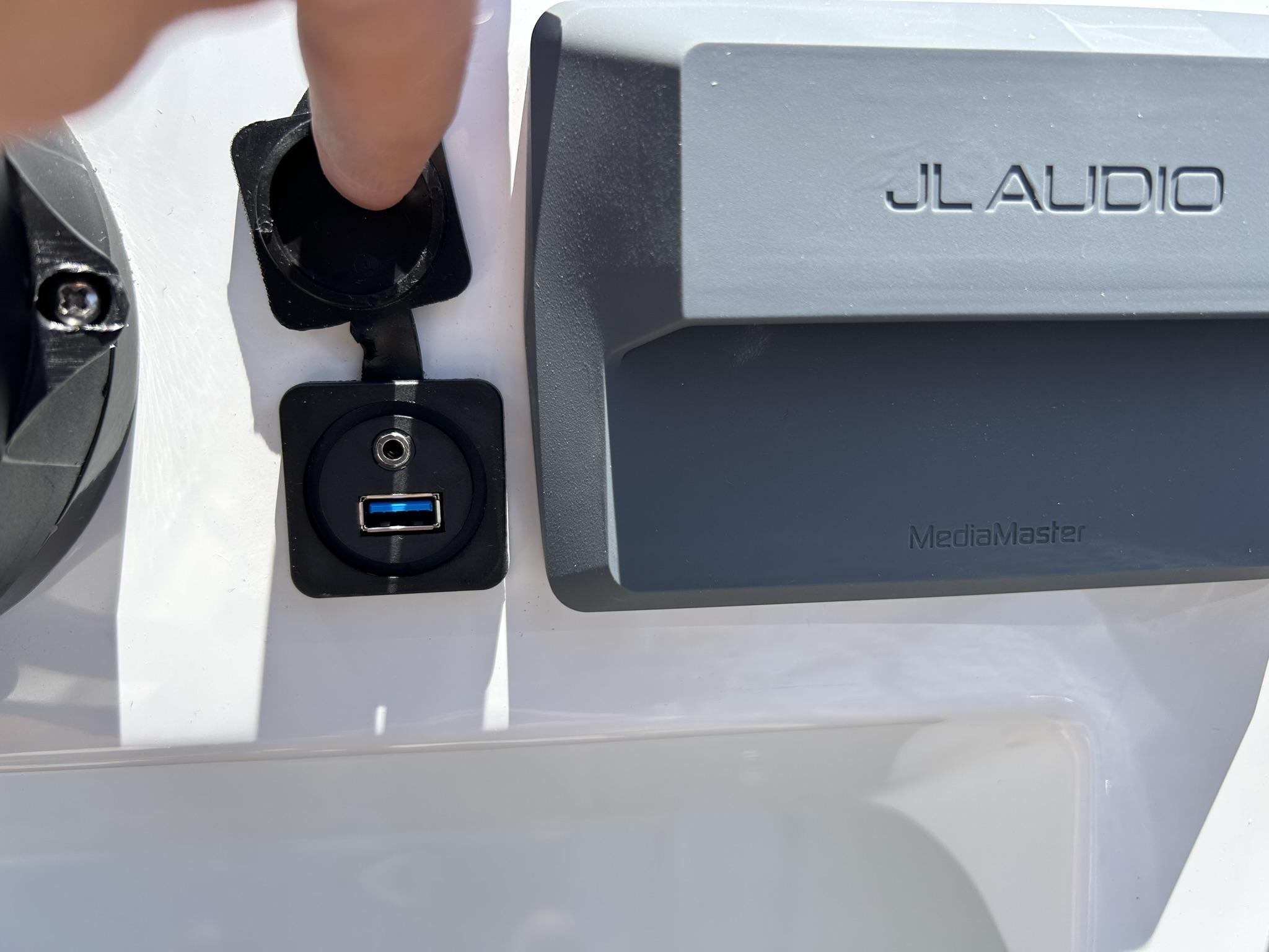 Slide: The Image of USB port and JL Audio MediaMaster on 2024 JC 247 TT - DSL Sport boat. - 20