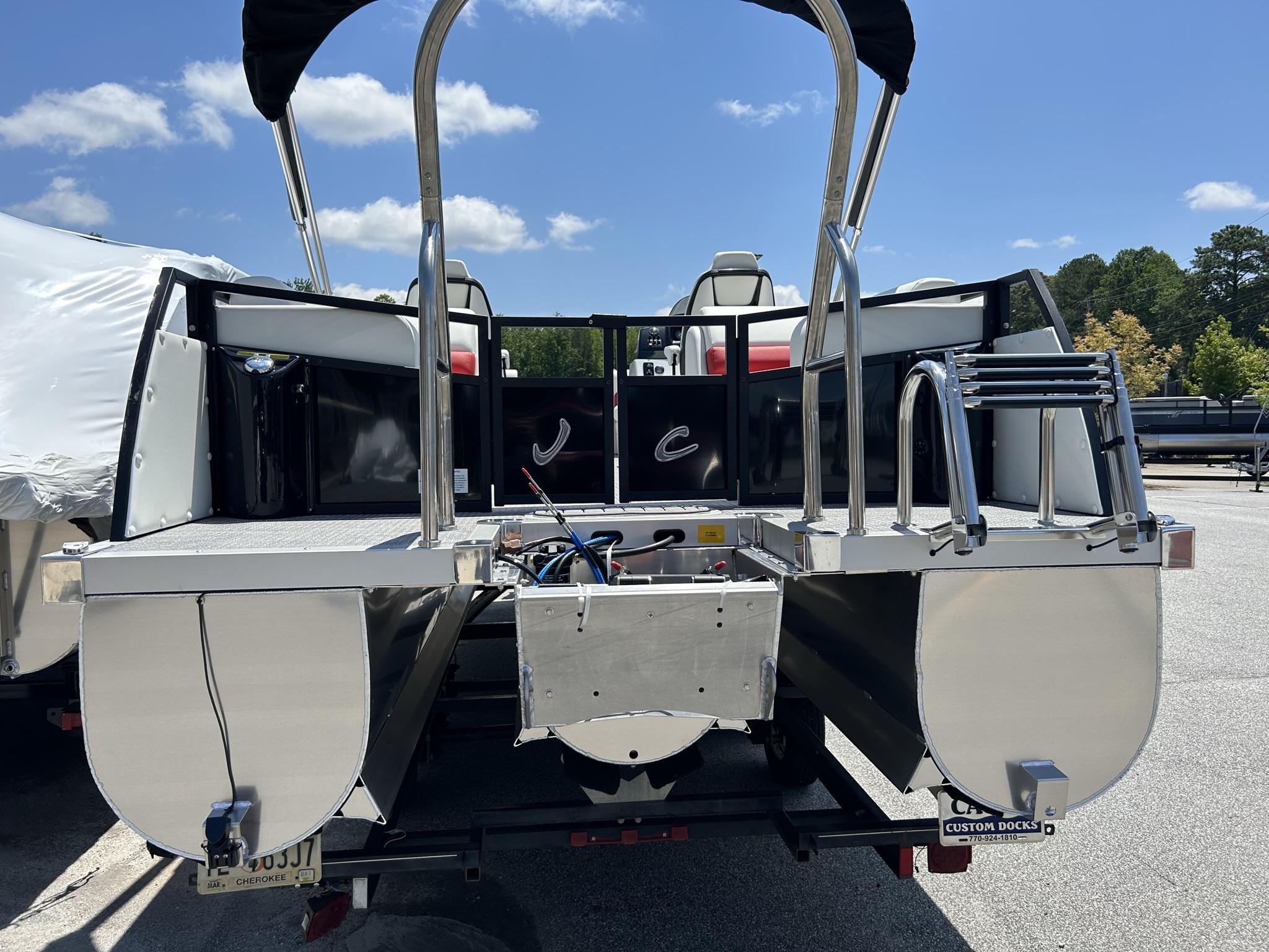 Slide: The Image of 2024 JC 247 TT - DSL Sport boat with Suzuki 250HP engine, rear view. - 22