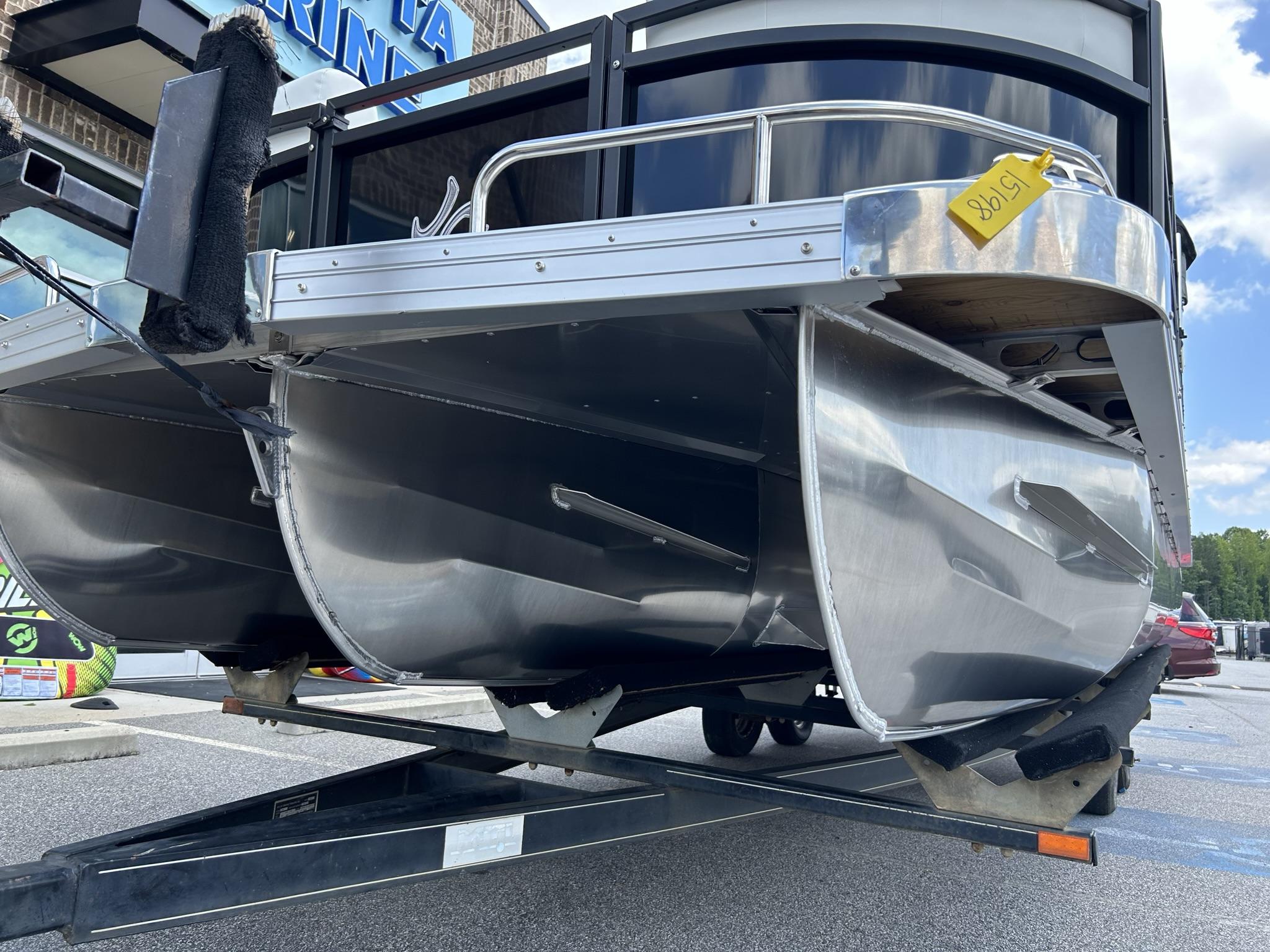 Slide: The Image of 2024 JC 247 TT - DSL Sport pontoon boat with Suzuki 250HP engine on trailer. - 29