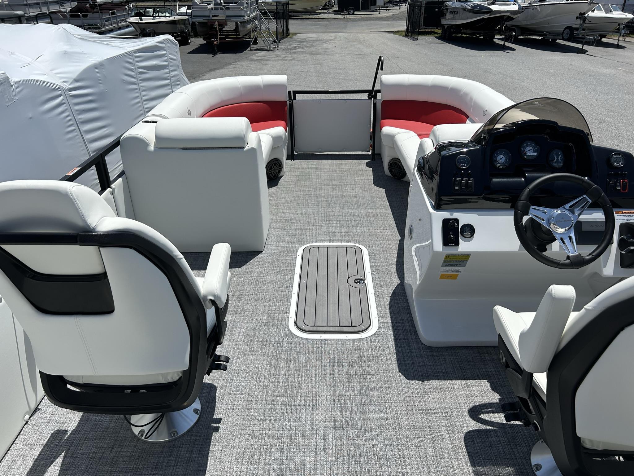 Slide: The Image of 2024 JC 247 TT - DSL Sport boat interior with Suzuki 250HP engine, featuring modern seating and controls. - 3
