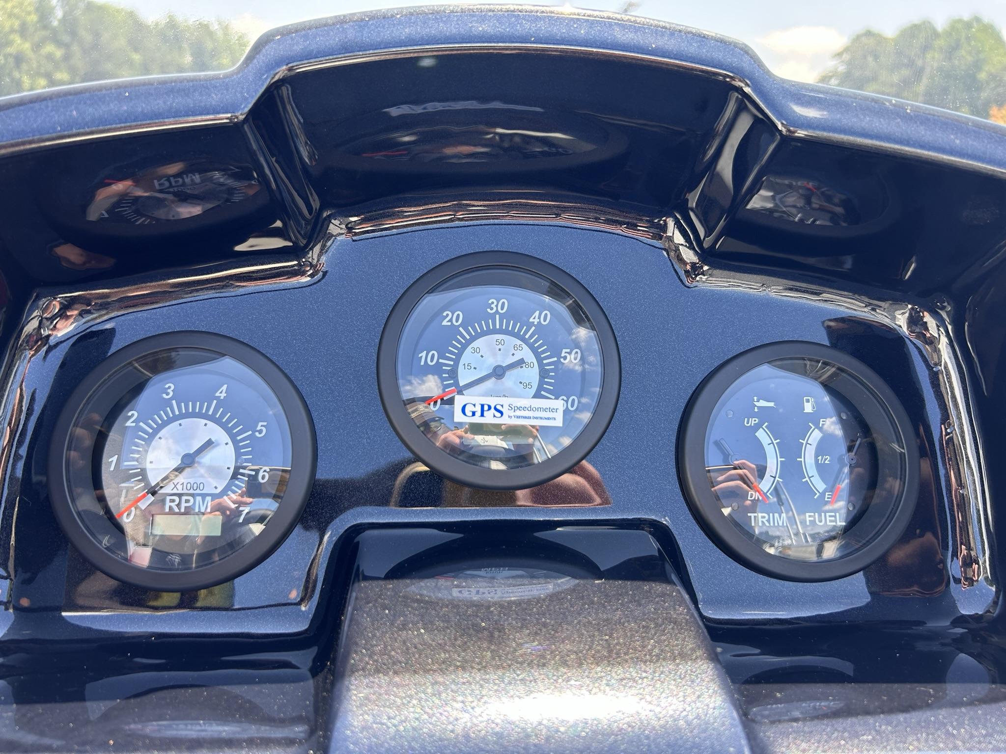 Slide: The Image of Dashboard of 2024 JC 247 TT boat with RPM, speedometer, and fuel gauges. - 6