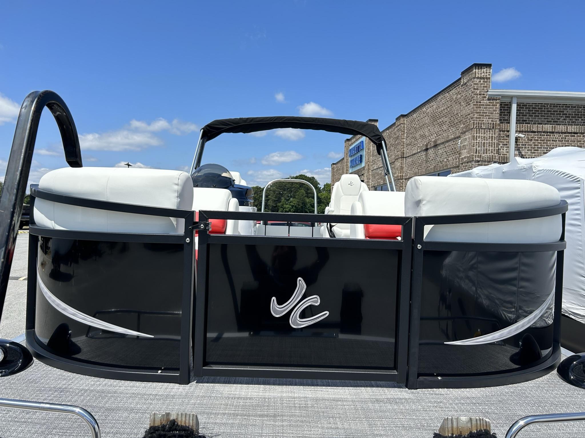 Slide: The Image of 2024 JC 247 TT DSL Sport pontoon boat with Suzuki 250HP engine, docked under blue sky. - 9