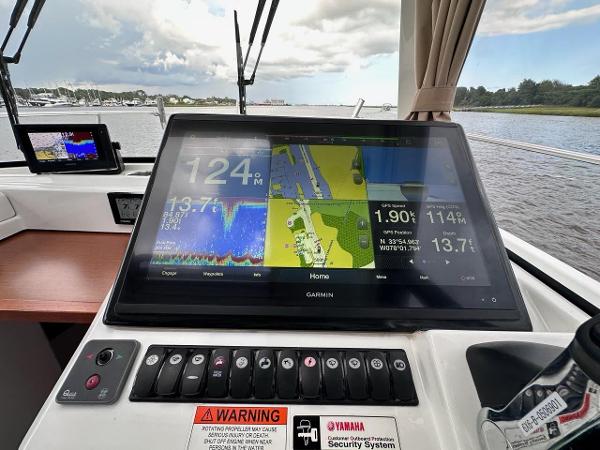 Slide: The Image of Control panel of 2016 Jeanneau Merry Fisher 855 with Garmin navigation system. - 10