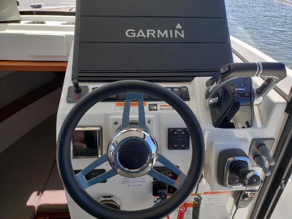 Slide: The Image of Helm of 2016 Jeanneau Merry Fisher 855 with Garmin navigation system. - 11
