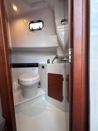 Slide: The Image of 2016 Jeanneau Merry Fisher 855 boat bathroom with toilet and sink - 24