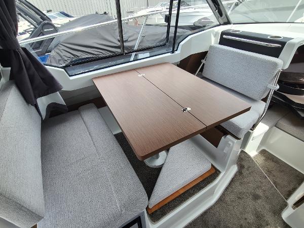Slide: The Image of Interior seating and table area of 2021 Jeanneau NC 795 S2 boat. - 6