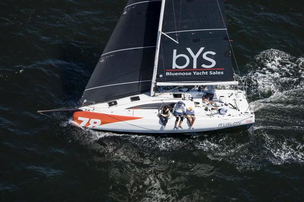Slide: The Image of 2023 Jeanneau Sun Fast 3300 sailing with Bluenose Yacht Sales branding. - 0