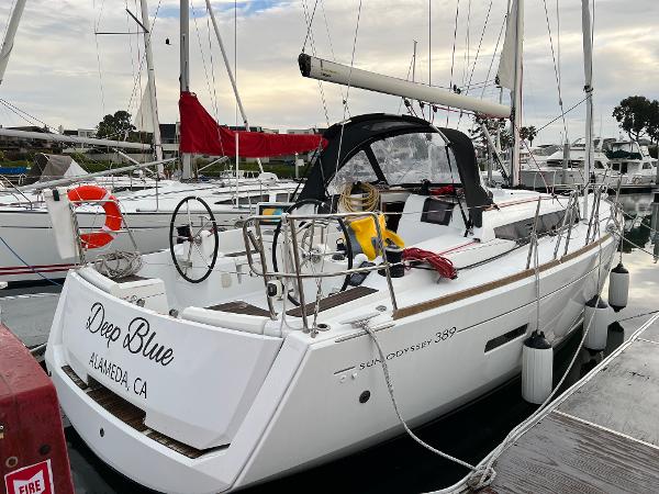 Slide: The Image of 2020 Jeanneau Sun Odyssey 389 sailboat docked, named "Deep Blue," in Alameda, CA marina. - 3
