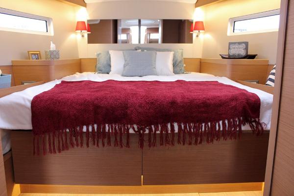 Slide: The Image of Luxurious cabin interior of 2024 Jeanneau Sun Odyssey 440 yacht with cozy bedding. - 3