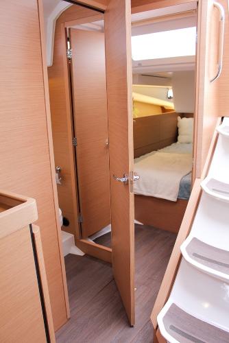 Slide: The Image of Interior of 2024 Jeanneau Sun Odyssey 440, featuring a cozy cabin and modern design. - 35