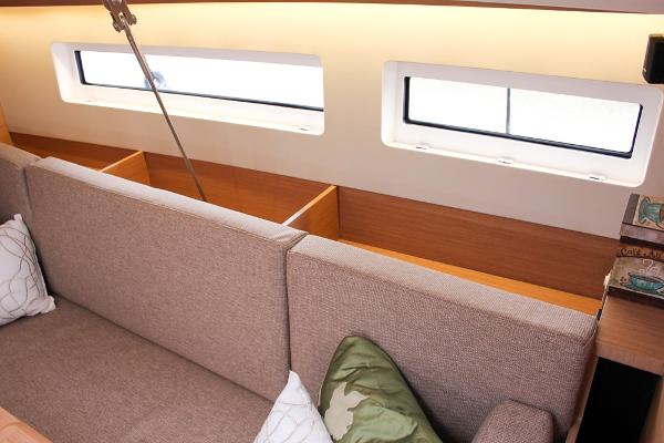 Slide: The Image of Interior of 2024 Jeanneau Sun Odyssey 440 yacht, featuring a cozy seating area and modern design. - 37