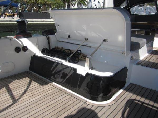 Slide: The Image of Open storage compartment on the deck of a 2025 Jeanneau Yacht 65. - 39