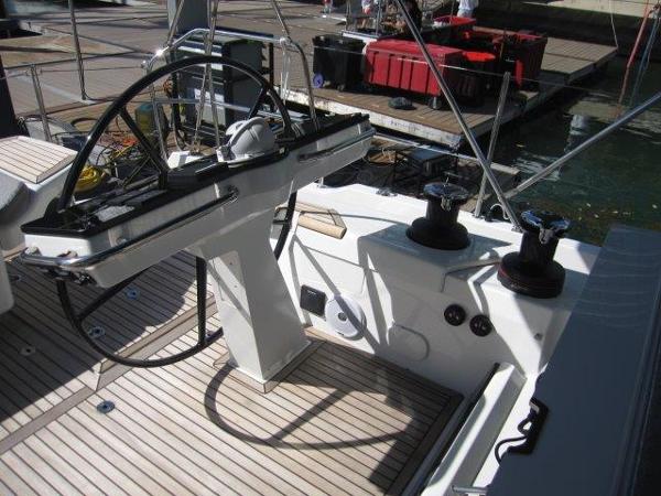 Slide: The Image of Cockpit of 2025 Jeanneau Yacht 65 with steering wheel and winches. - 42